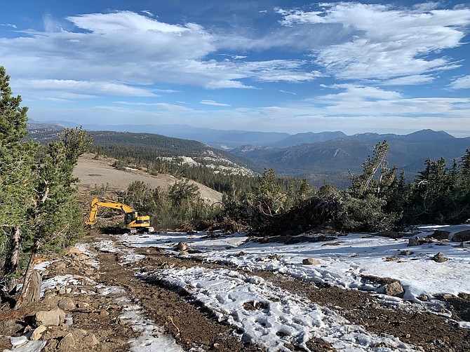 Work is underway to repair the damage done to contain the Caldor Fire after it hit 100 percent on Thursday. U.S. Forest Service photo