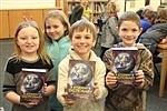 Ohop Grange continues tradition of donating dictionaries to local third graders