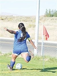 Lady Bucks split with conference rivals