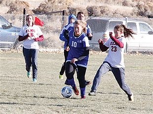 Elko girls score two late goals to defeat Lowry