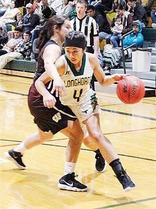 Lady Longhorns split home finales with Wolverines, Ladycats