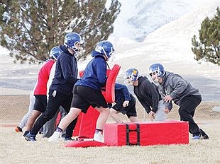 High school football cleared to play by Sisolak