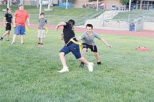 Youngsters take to the field at Up From The Mucc youth football camp