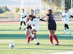 Lady Longhorns drop league match to Pershing County