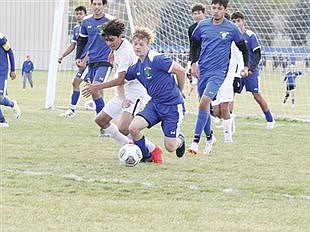 Lowry boys clinch playoff spot with wins over Dayton, Fernley; ties Elko 1-1