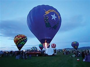 Weather interferes with launching balloons, but pilots put on light show