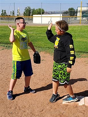 Battle Mountain High School softball team puts on clinic for elementary summer school students