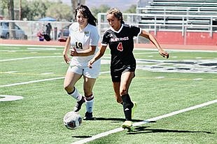 Pershing County soccer splits league matches
