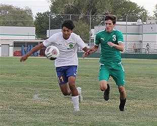Bucks drop league opener to Churchill County
