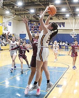 Lady Bucks remain undefeated with road wins over Hug, North Valleys