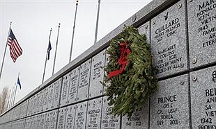 In annual tradition, volunteers place thousands of wreaths at Nevada veterans’ graves
