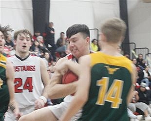 PCHS boys split pair of games