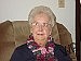 Retired teacher Barbara Foree shows off one of the scarves she made while practicing her knitting.