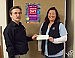 HGH employee committee collects change  to support domestic violence awareness