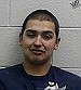 Local man arrested on suspicion of discharging firearm, other charges 