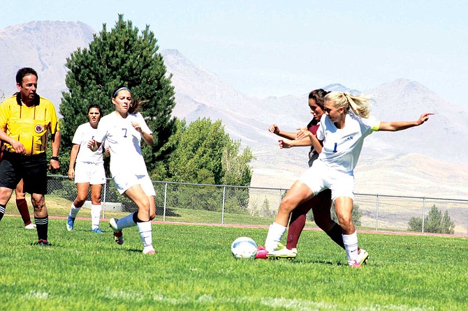 Lady Bucks soccer team splits pair of games 