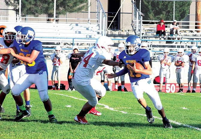 Lowry freshmen knock off Colts, JV falls in exciting finish