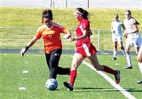 Lady Longhorns fall to Warriors, beat Lions