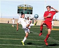 BMHS boys finish regular season with split