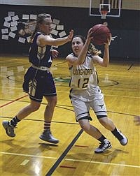 Lady Longhorns run away from Lions