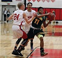 Longhorns split pair of road games, stay in playoff hunt