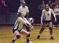 Lady Longhorns clinch playoff berth with four-set win over Mustangs