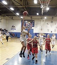Lowry JV girls cruise to win in opener against Mustangs 