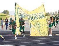 Longhorns dominate Mustangs 