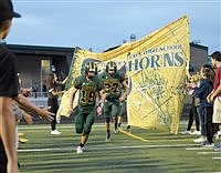 Longhorns tame the Lions