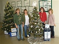 Holiday trees auctioned for Chamber