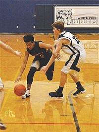 Longhorn varsity boys blowout Bobcats, extend winning streak to 13 games