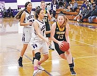 Lady Longhorns outlast Lions in overtime thriller