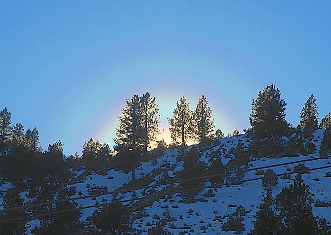 Sue Cooke captured some colorful rings around the sun in the sunset from Foothill Road.