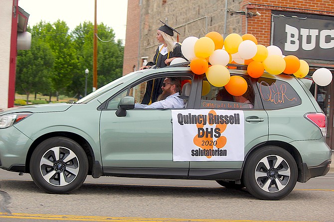 Douglas High School Salutatorian Quincy Russell rides in the 2020 graduation parade through Gardnerville.