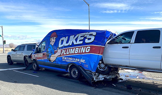 Three of the four vehicles involved in a collision at Highway 395 and Airport Road on Tuesday morning.