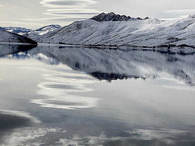 Topaz Lake is a silver mirror among white hills in this photo taken during a fishing trip.
