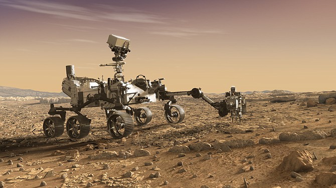 An artist’s rendition of the Perseverance Rover "studying rocks with its robotic arm."