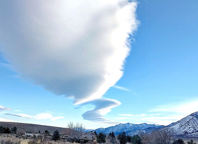 A band of clouds winds across Carson Valley's sky.