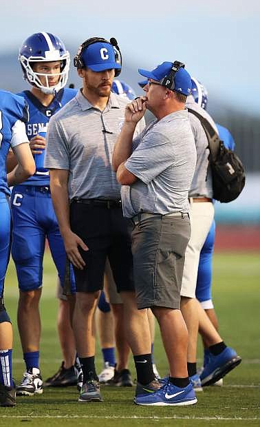 Carson High head coach Blair Roman looks on during a timeout at a Senator football game in 2019.