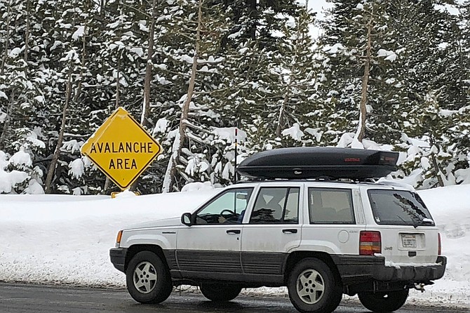 Photo: Scott Sonner/AP, file
Skiers leave the parking lot at Alpine Meadows ski resort on Jan. 17, 2020 where avalanche killed one skier and seriously injured another.