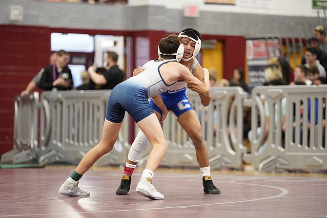 Carson High’s Ariel Vega wrestles at Cimarron-Memorial High School last February during the 2020 NIAA Class 4A State Wrestling Tournament. Vega, along with six other Senator wrestling teammates, won’t get a senior season due to the ongoing pandemic.