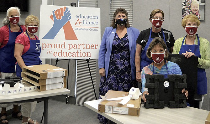 The Assistance League worked with Education Alliance to donate over 430 laptops for Washoe County school studentns.
