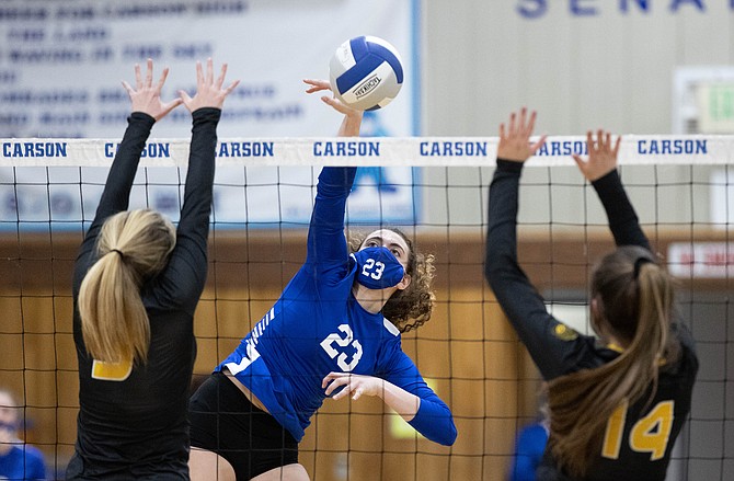 Carson High's Cami Larkin deposits a kill against Galena Thursday evening. Larkin and several other upperclassmen are expected to play big roles for the Senators in the shortened fall sports season.