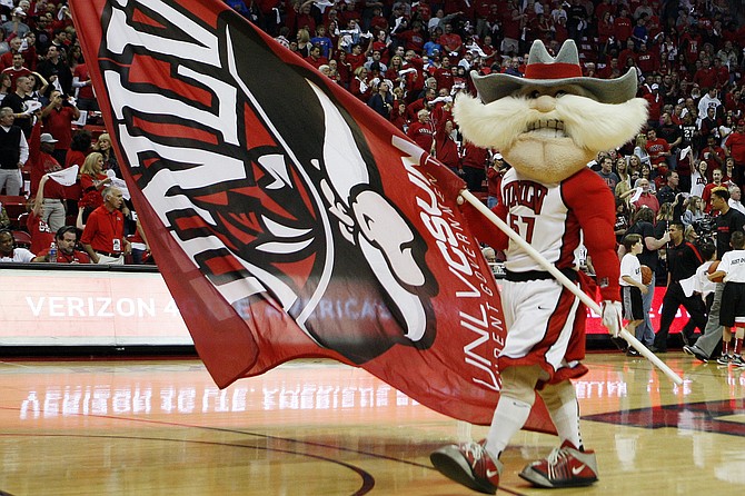 UNLV's mascot "Hey Reb!" at a 2012 game in Las Vegas. Nevada lawmakers are considering legislation that would require schools to get rid of racially discriminatory logos and mascots and require officials to push for the renaming of mountains, trails or any other geographic points with racially offensive names. (Photo: Isaac Brekken/AP, file)