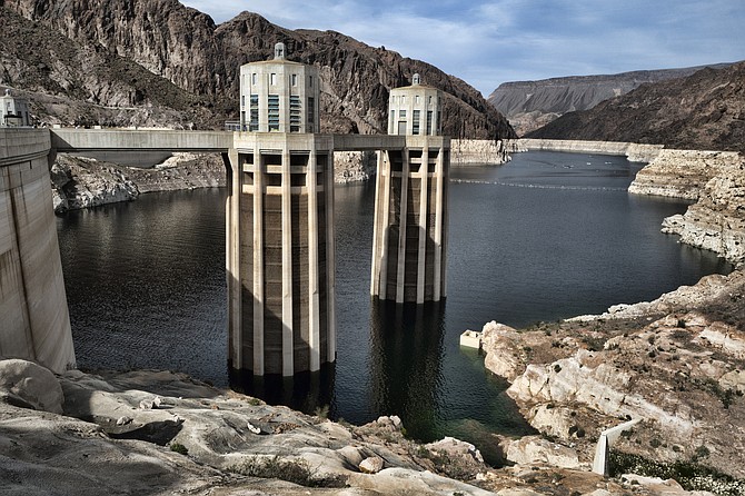 A bathtub ring of light minerals shows the high water mark of Lake Mead as seen from the Hoover Dam, Ariz., on March 26, 2019. (Photo: Richard Vogel/AP, file)