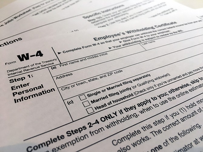 (Photo: Patrick Sison/AP, file)
The IRS will delay the traditional April 15 tax filing due date until May 17 to cope with added duties and provide Americans more flexibility.
