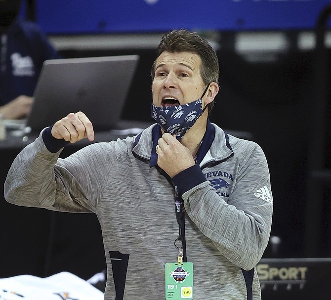 Nevada head coach Steve Alford instructs his team against Boise State in the quarterfinals of the Mountain West Conference men's tournament March 11 in Las Vegas. (AP Photo/Isaac Brekken)