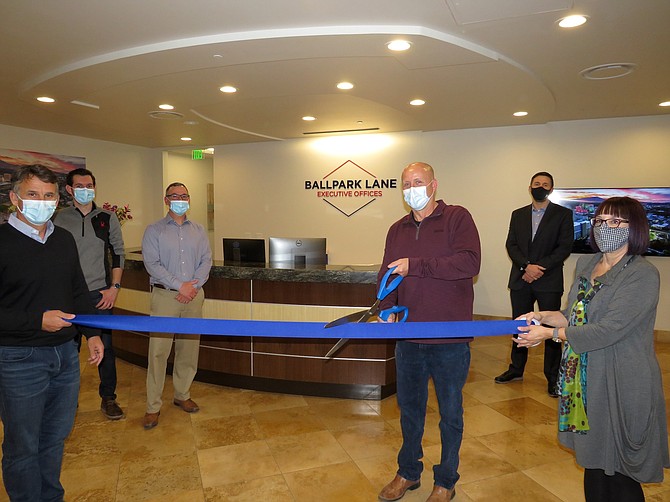 Key staff of Ballpark Lane Executive Offices gathered for a small, socially-distanced ribbon cutting on March 5 with members of the Reno+Sparks Chamber of Commerce.