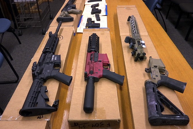 “Ghost guns” on display at the headquarters of the San Francisco Police Department on Nov. 27, 2019. A proposal to ban build-your-own weapons known as ghost guns is sparking passionate for-and-against arguments in the Nevada Legislature, just over three years after Las Vegas experienced the deadliest mass shooting in modern U.S. history. The bill introduced on March 15 would outlaw the possession and sale of homemade firearms. (AP Photo/Haven Daley, File)