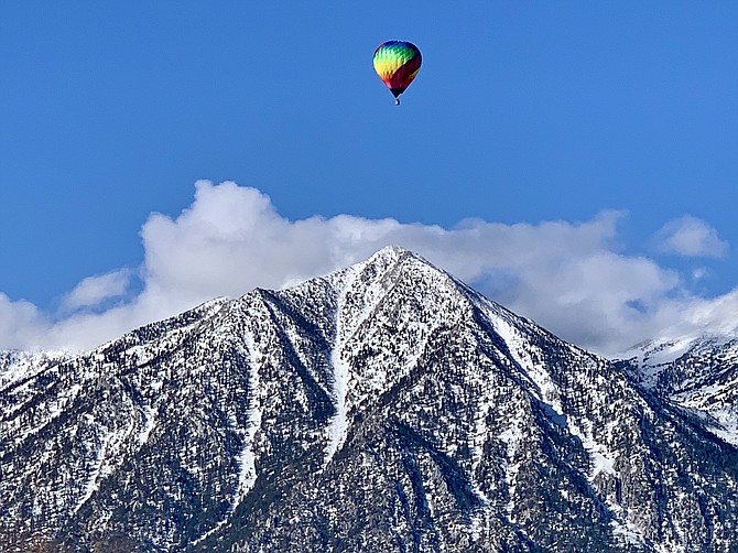 Gary Dove took a photo of the balloon flying over Carson Valley with Jobs Peak in the background. The balloon has been drew a lot of attention from Valley photographers on Sunday.